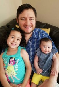 My husband with our two daughters.