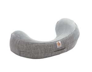 Gray nursing pillow with curved U shape. Used for breastfeeding.